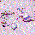 a dithered image of metal hearts on sand